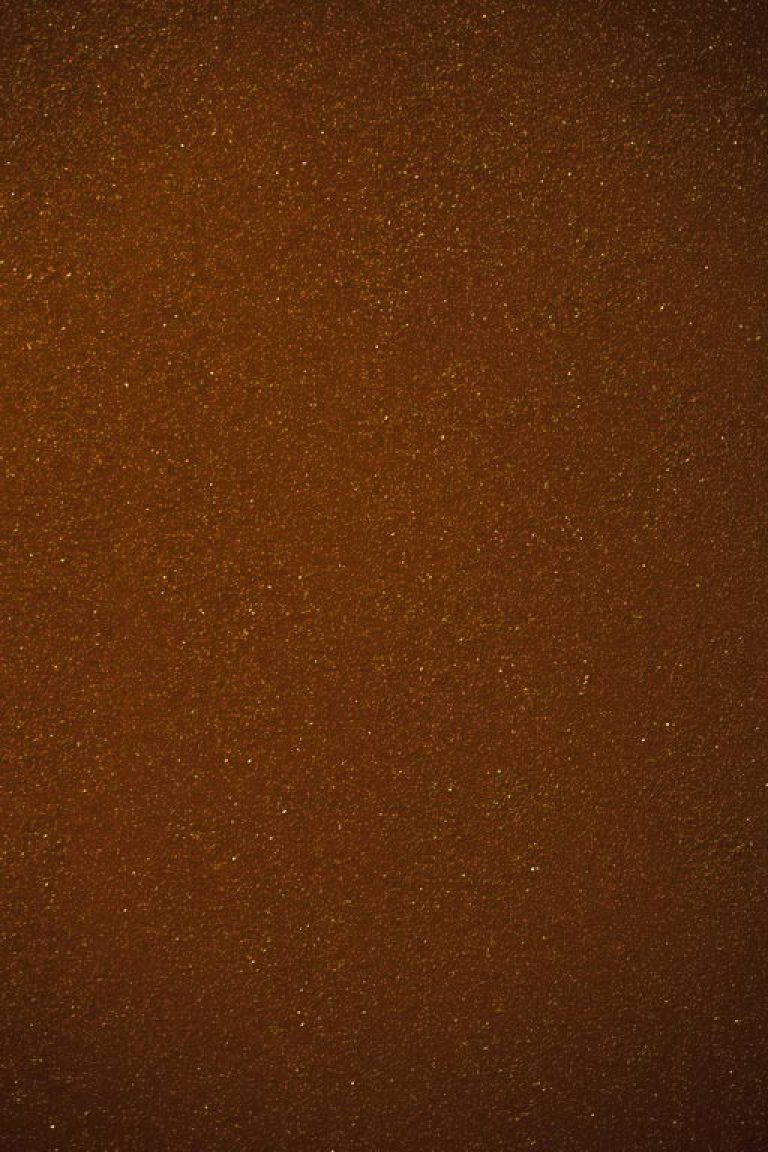 Over a warm brown ground.