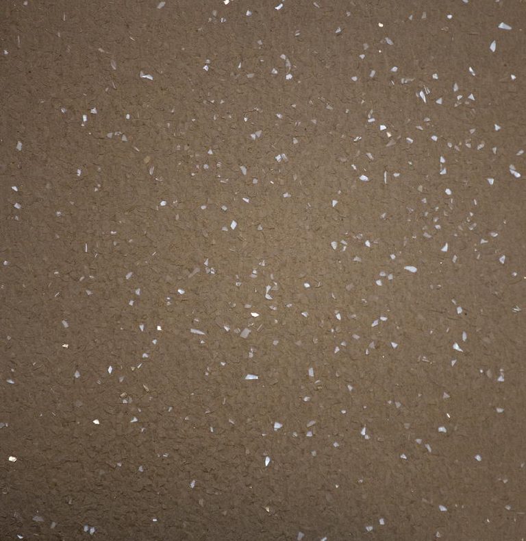 The same flakes over beige — the ground changes the whole character.