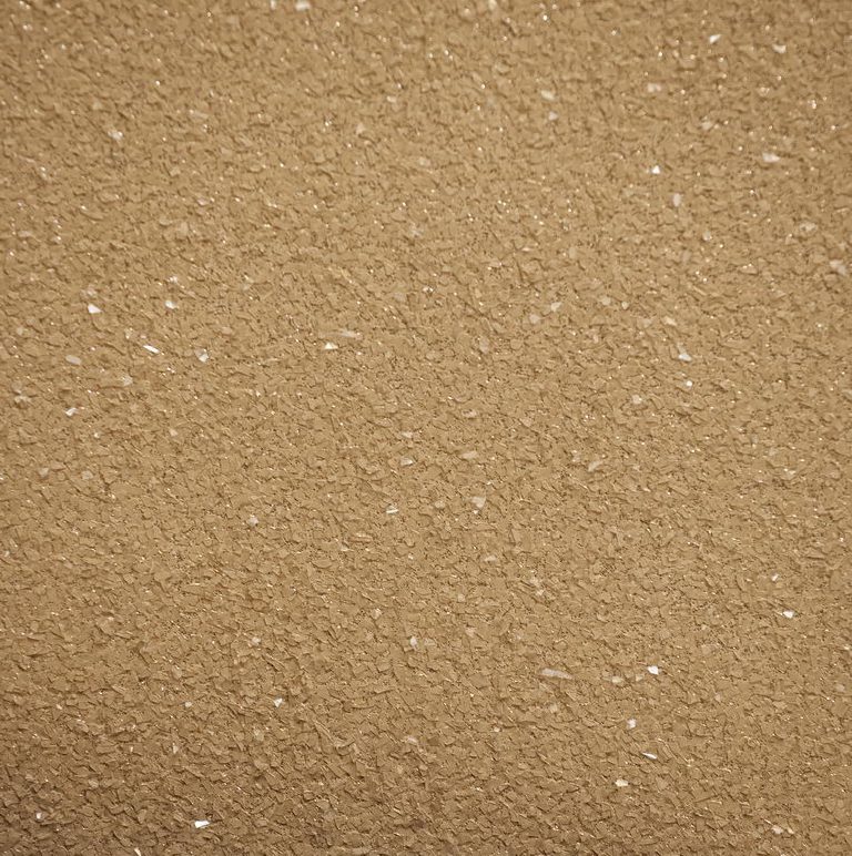 Glitter flake over a cream ground.
