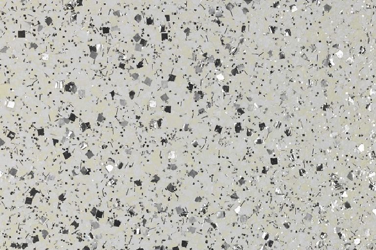 Silver and black flake over a pale grey ground.