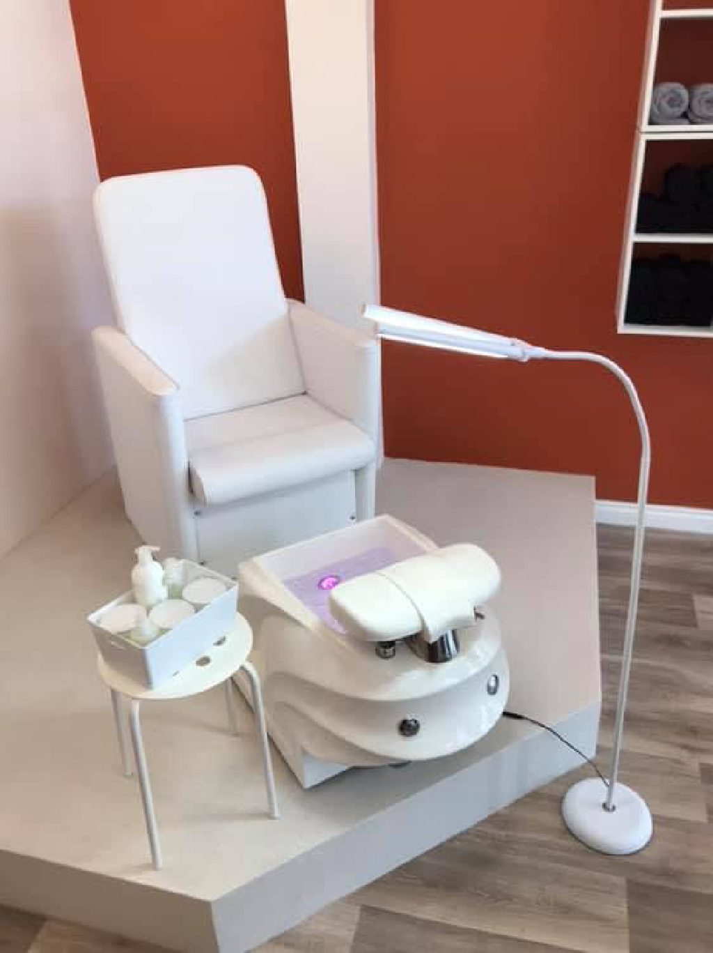 The pedicure chair on its plastered plinth
