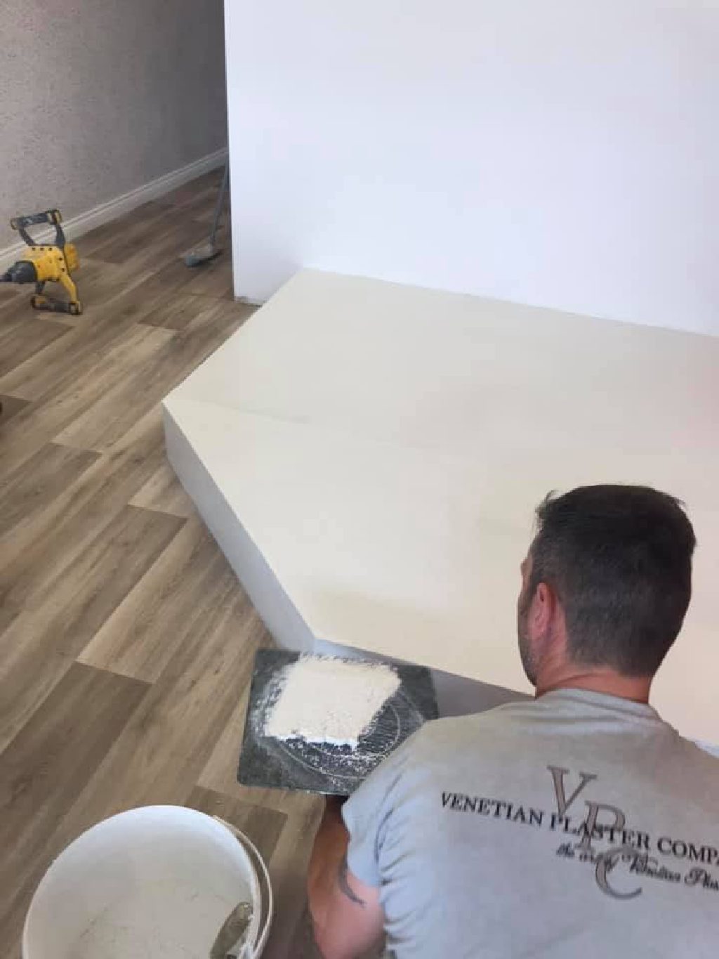 The plinth being plastered before the salon opened