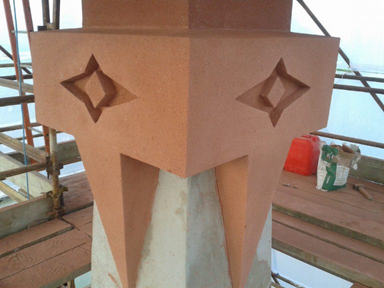 The finished capital square on, with a recessed cross on each face