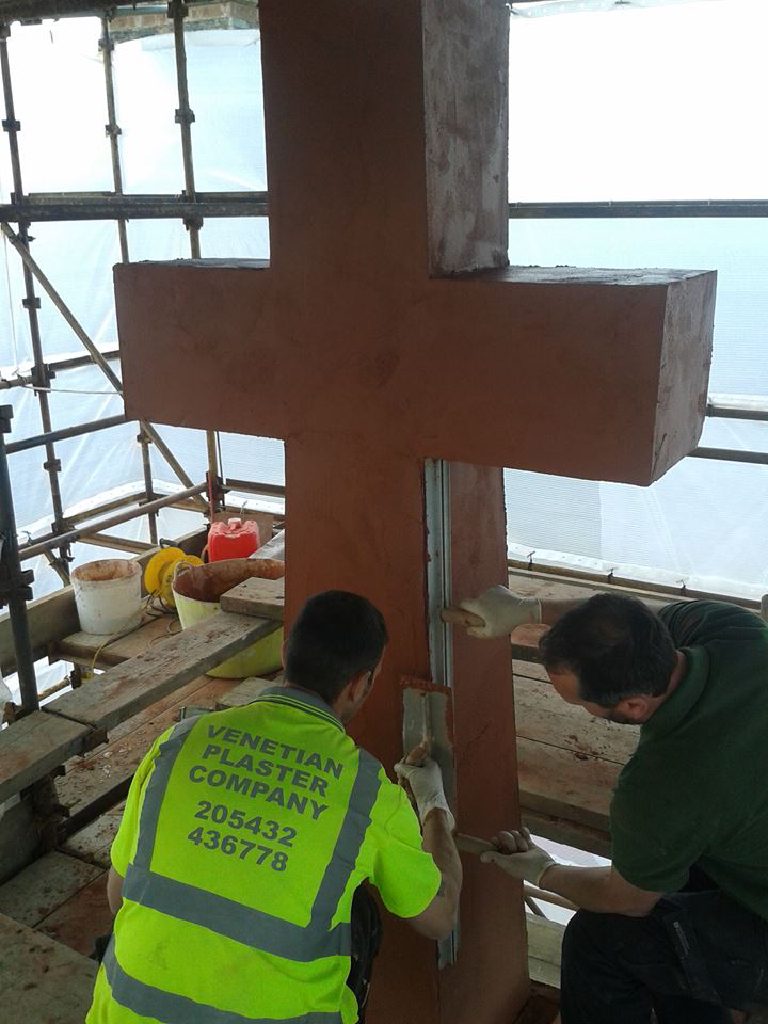 Rendering the shaft below the cross arms, working to a rule held against the edge