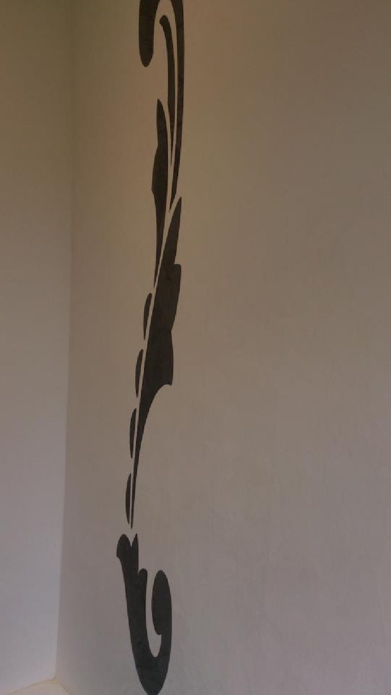 White Marmorino with black stencil
