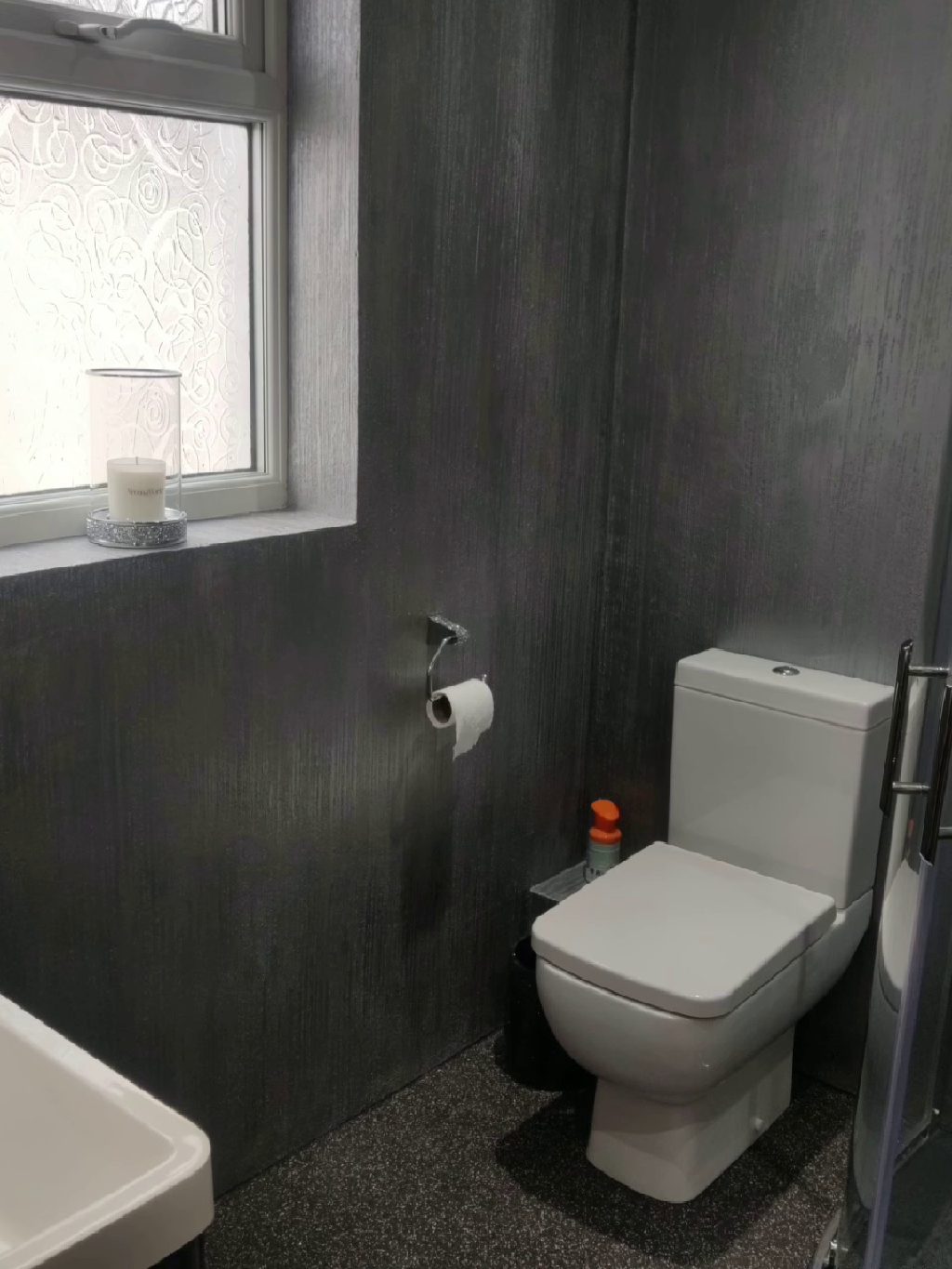 The finished bathroom, metallic silver walls and crystal quartz floor