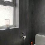 The finished bathroom, metallic silver walls and crystal quartz floor