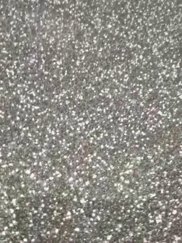 The crystal quartz floor close up, natural stone catching the light