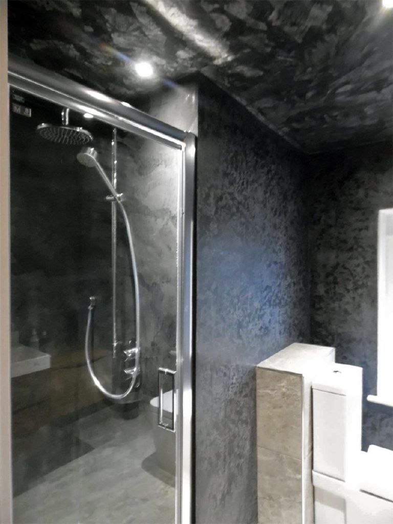 The shower area was sealed with a clear breathable coating, creating a dramatic yet practical space