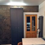 The feature wall with the wall clock it was made to match