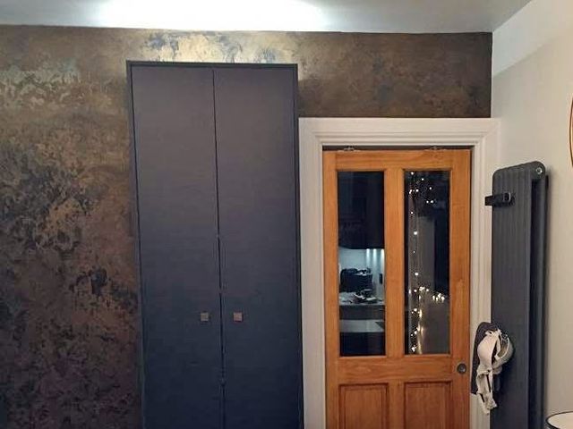 Black Marmorino Kitchen Feature Wall — the finish this client is describing
