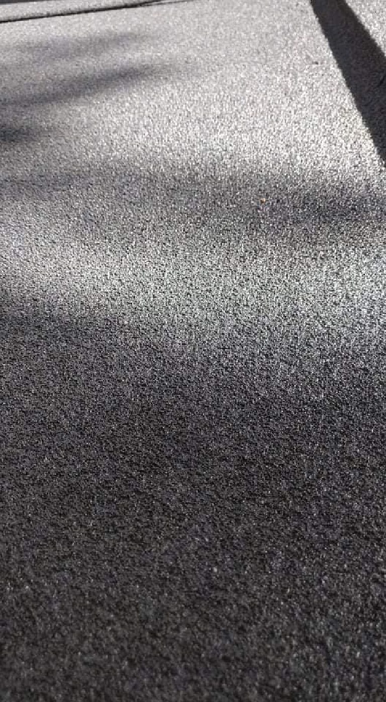 The sprayed cork texture up close on the finished roof