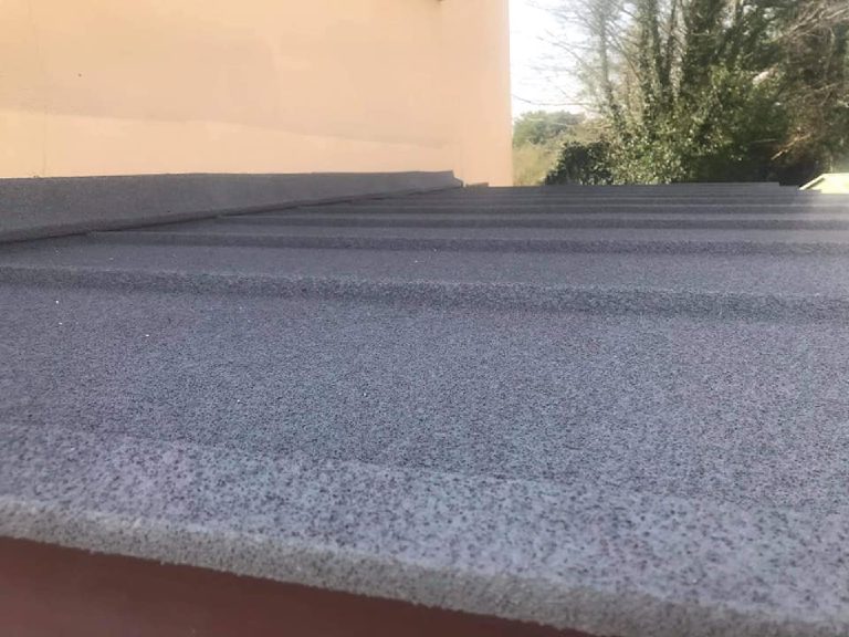 Close-up of the sprayed cork texture across the roof panels