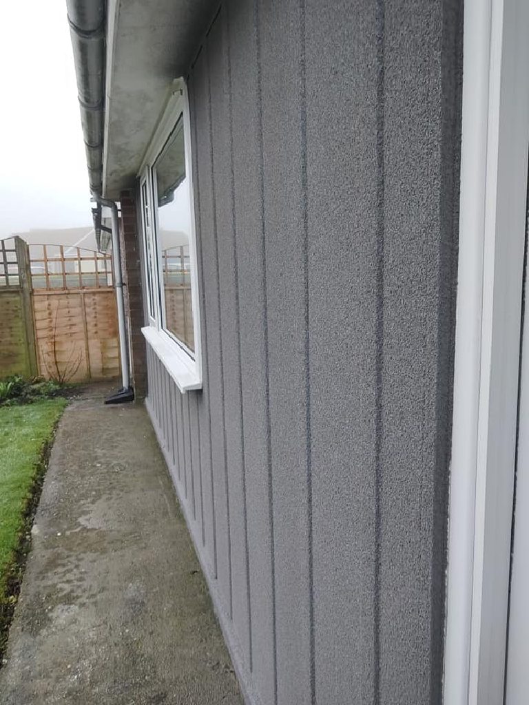 The rendered side wall seen in perspective down the narrow side passage