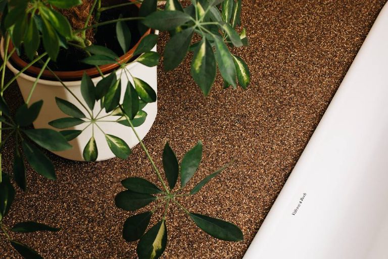 The natural stone texture of the crystal quartz up close beside a plant pot