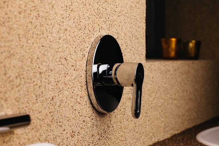 The shower valve set into the crystal quartz wall
