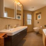 The finished bathroom with crystal quartz walls, reveals and floor