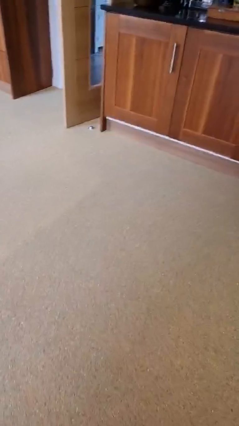 The quartz floor running past the open door and on through to the next room