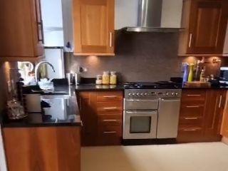 Crystal Quartz Through a Kitchen, Utility and W.C.