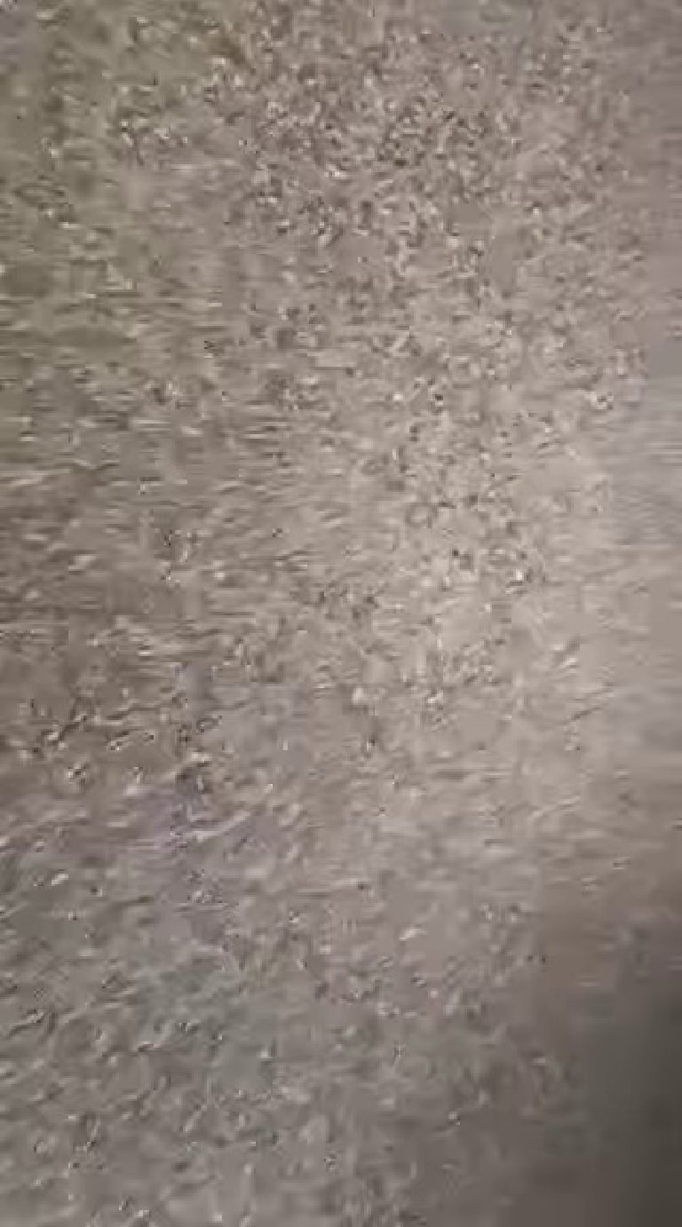 The natural stone texture with its silver glitter, close up