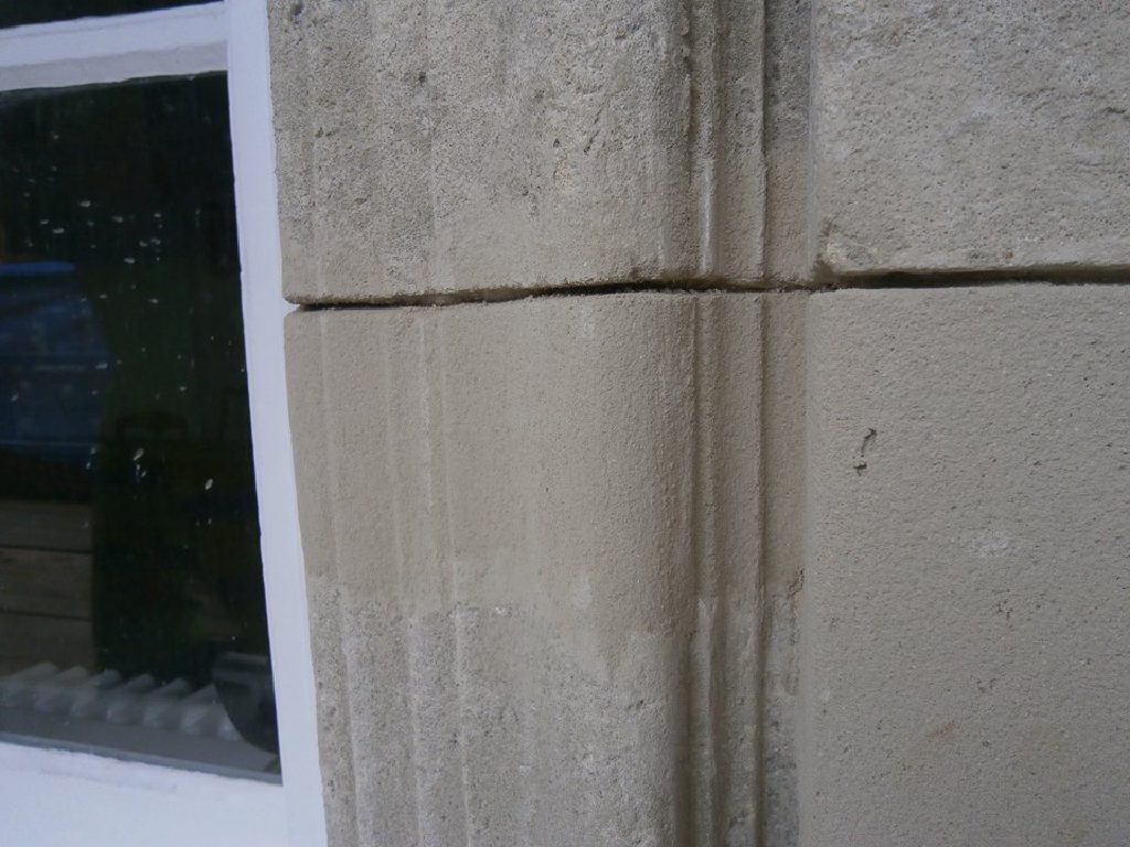 Restored fluted sandstone window surround at Douglas Town Hall