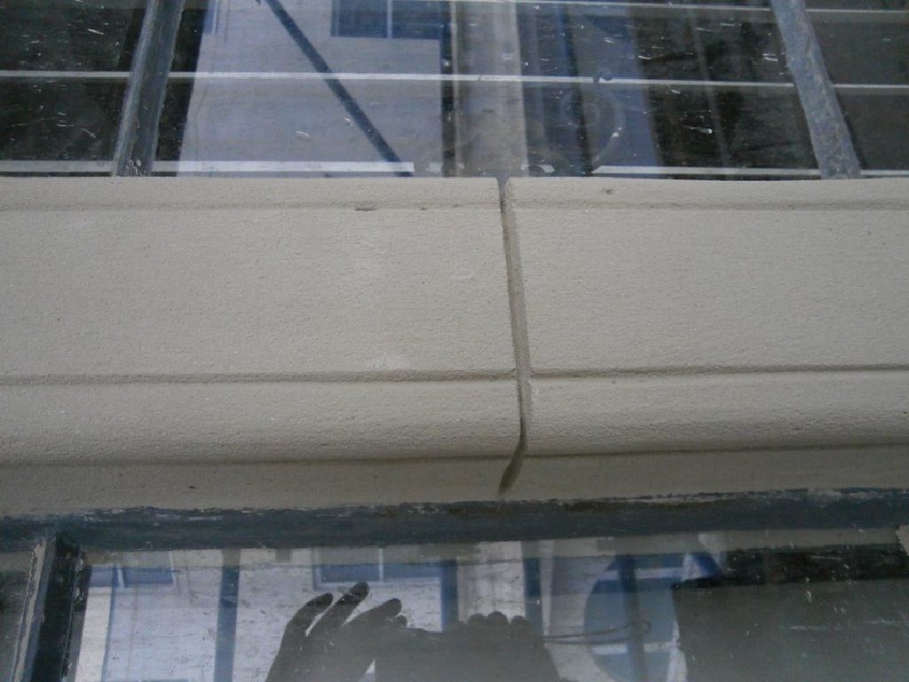 Freshly restored stone moulding between two windows at Douglas Town Hall