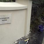 Ellenbrook House name plaque on the smoothly rendered curved pillar
