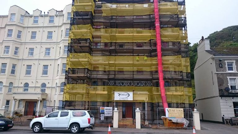 Application of mineral render coat and paint