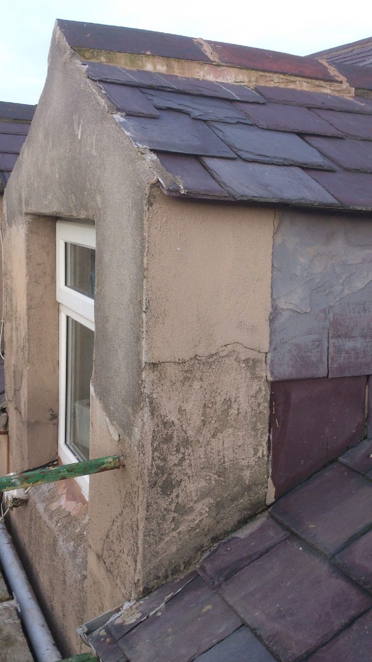 Damaged render in need of external insulation and repair