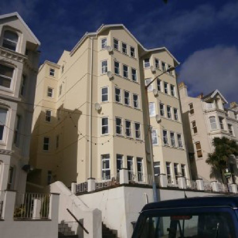 Falcon Cliff Apartments beside its neighbours