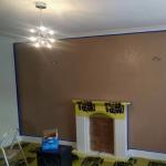 The wall masked up in base coat before the flakes went on