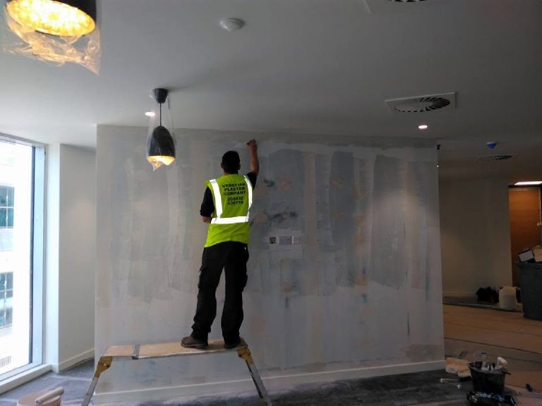 Base coats starting to go on over the blank wall