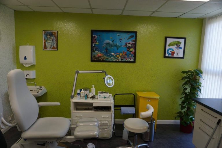 The lime green feature wall running the room