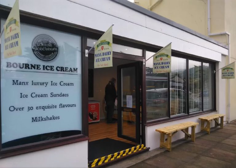 The finished shopfront, freshly rendered