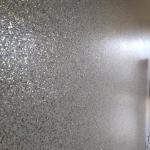 Close view of the champagne glitter flake catching the light