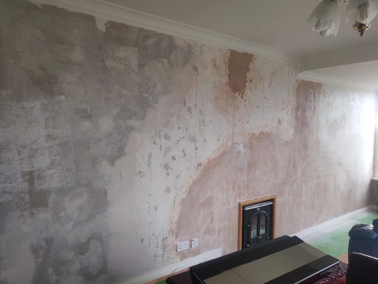The stripped walls and covered floor before the glitter went on
