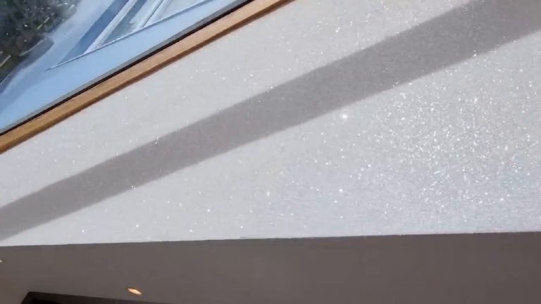 The glitter finish up close in full sun, individual flakes flaring white