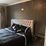 The bedroom with its sparkling feature wall
