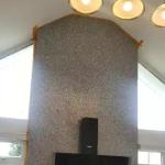 The whole feature wall from across the kitchen, windows on both sides