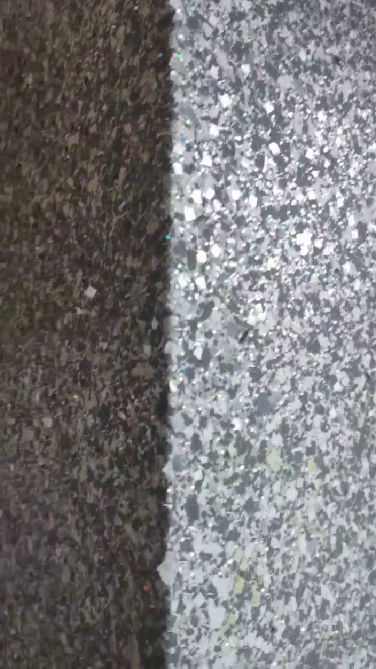Two faces of the same wall, one in shade and one lit, the flake blazing on the lit side