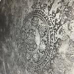 The stencilled medallion in silver wax, close to