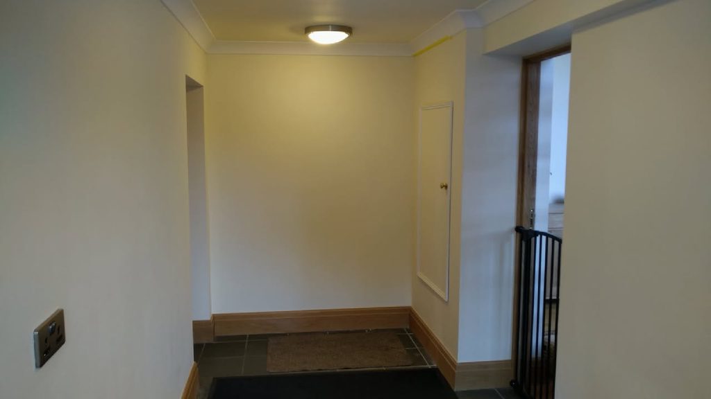 The plain hallway before its glitter flake finish