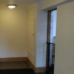 The plain hallway before its glitter flake finish