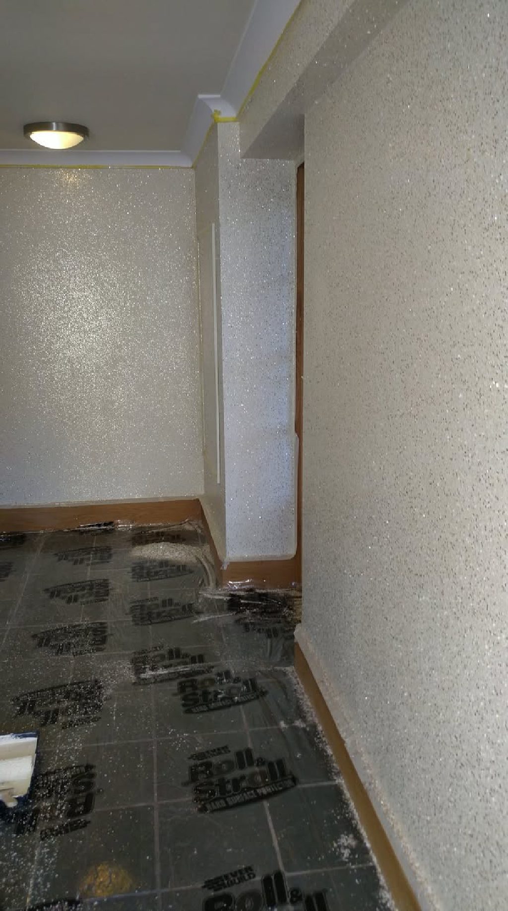 The hallway walls covered in glitter flakes