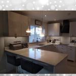 Rachel's modern kitchen with its sparkling splashbacks