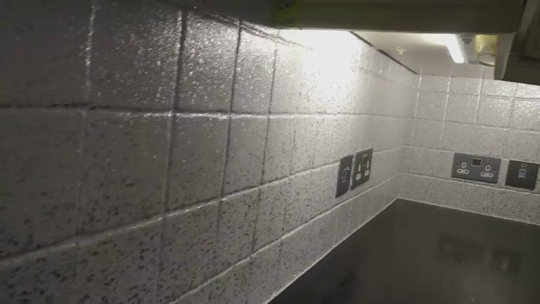 The glittered tiles catching the under-cabinet lighting