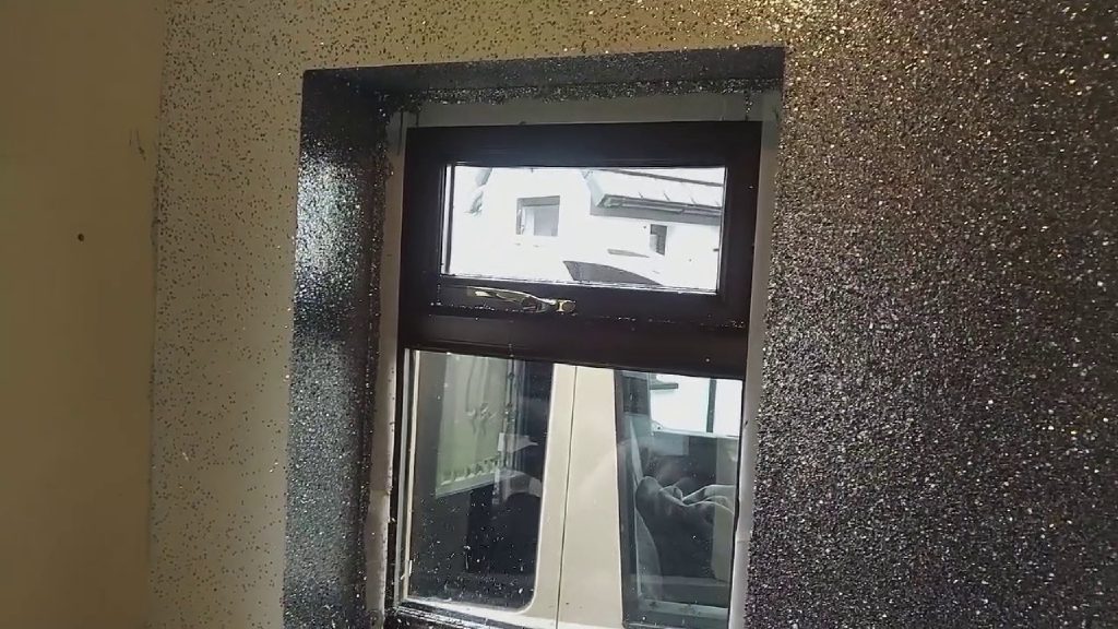 The window surrounded by the gun metal glitter finish