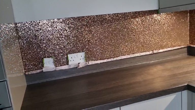 Close view of the copper and gold flake packed edge to edge with the sockets set into it