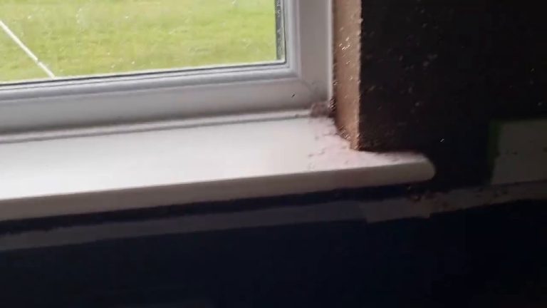The splashback running down to meet the end of the white window sill