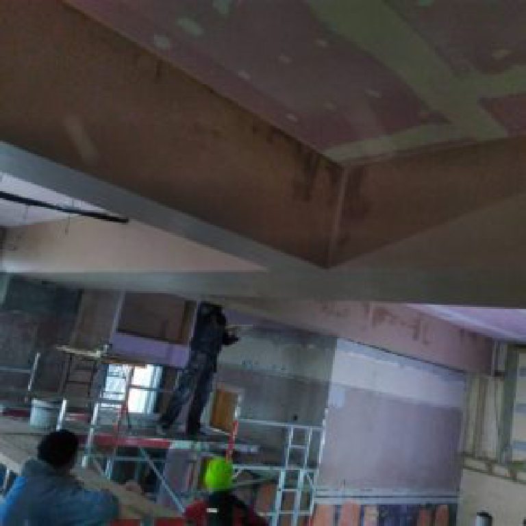 Working from the tower, base coats going over the bulkheads
